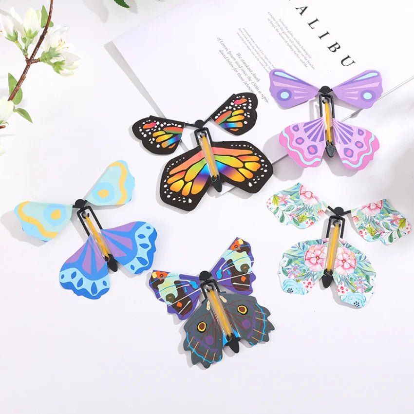 Magic Wind Up Flying Butterfly In The Book Rubber Band Powered Magic Fairy Flying Toy Great Surprise Gift Party Favor - StarJam